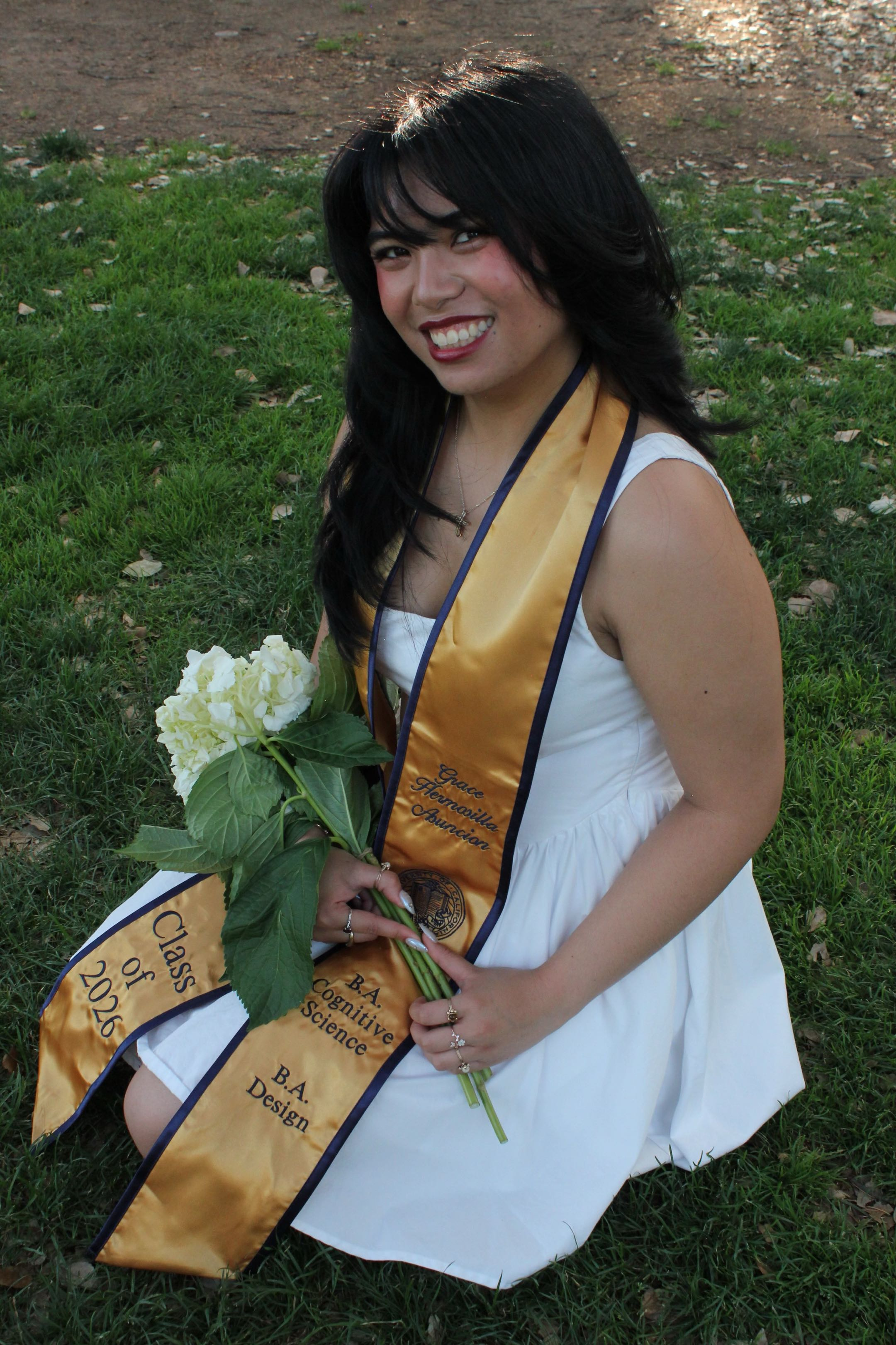 Grace Asuncion smiling at graduation